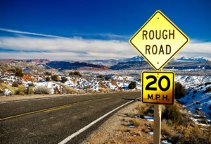 Road sign: Rough Road 20 Miles per Hour